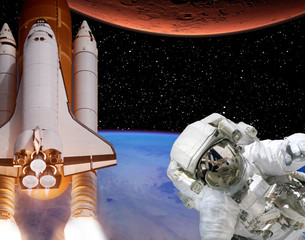 Rocket flies from earth to Mars. Astronaut in outer space. The elements of this image furnished by...