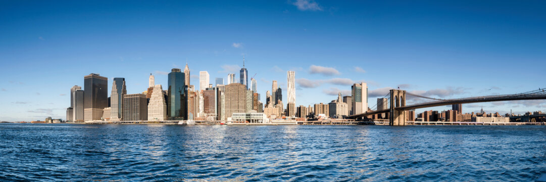 Manhattan skyline panorama with blue sky as background image