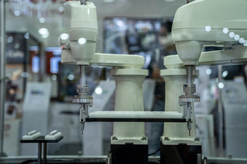 automation machine and detail close up in machine automatic with robotic automation technology for technology production factory