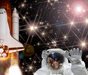 Rocket (shuttle), waving astronaut and galaxy. The elements of this image furnished by NASA.