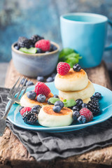 Cottage cheese pancakes with berries. Healthy Breakfast.