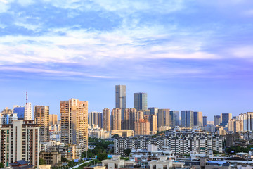 Fototapeta na wymiar Landscape of the city skyline at dusk, in Aerial view with skyscraper, modern office building and blue sky background in Fuzhou,Fujian,China.