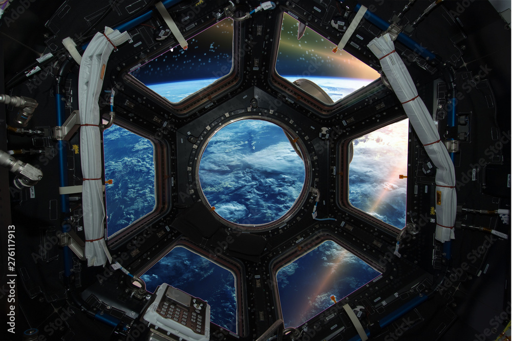 Canvas Prints fascinating sunrise on earth. spaceship window view. elements of this image furnished by nasa.