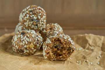Close up of dates oatmeal balls. No cook energy bites, selective focus