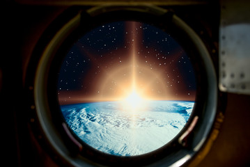 Sunrise, view from spaceship. Elements of this image furnished by NASA.