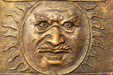 Character faces on copper metal plates