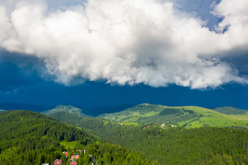 Aerial view of summer storm over the mountains.