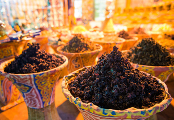 baskets with different ingredients on shelf of night market street shops