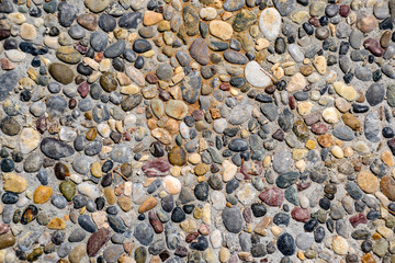 Background texture of the pavement of stone pellets