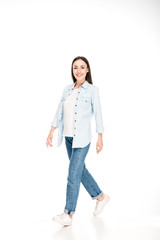 full length view of woman walking isolated on white