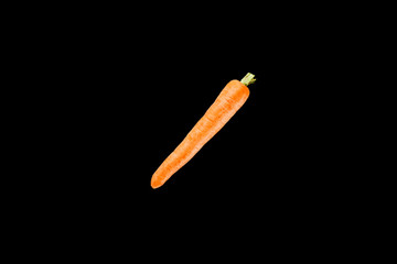 top view of fresh organic carrot isolated on black