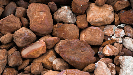 The stack of orange stones has a surface for the background.