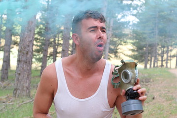 Dramatic image of man chocking outdoors