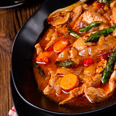 colorful turkey fricassee with asparagus and paprika