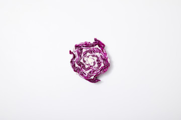 top view of cut red cabbage on white background