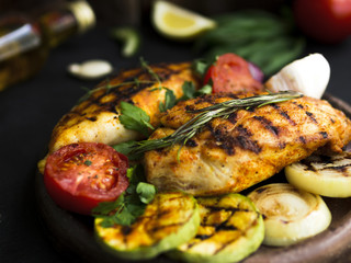 Grilled chicken breasts with vegetables