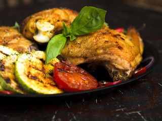 Grilled chicken breasts with vegetables