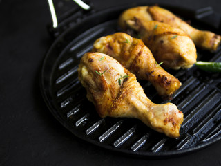 Cooked chicken legs with herbs