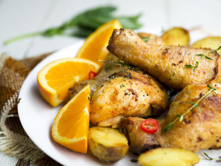 Cooked chicken legs with herbs
