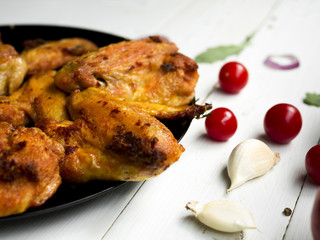 Cooked chicken wings with herbs