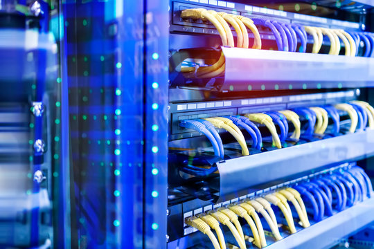 network cable connecting on network core switch close up