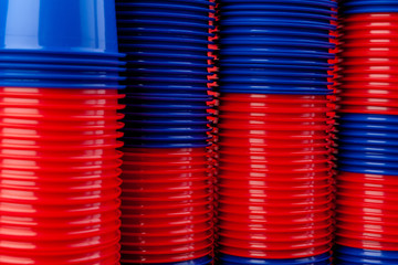 Plenty of plastic empty colorful cups close up