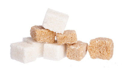 White refined sugar and brown unrefined sugar cubes
