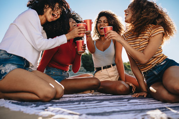 Friends chilling at the beach