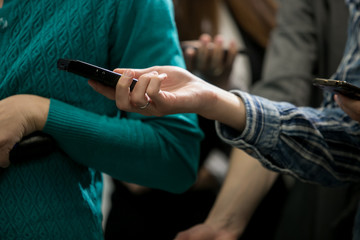 Obraz premium Media interview - group of journalists surrounding VIP