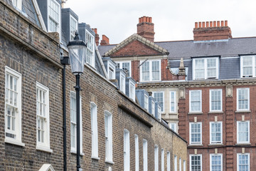 Fototapeta na wymiar A row of attractive terraced British townhouses