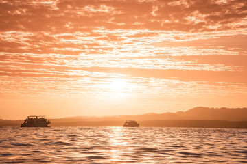 Tourist cruise boats at sunset, Sharm El Sheikh resort, Egypt