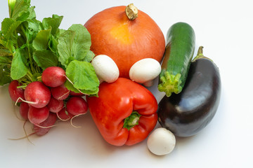 Pumpkin, eggplant, mushrooms, pepper, radish and courgette on white background