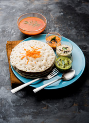 Set Dosa / Oothappam style dosa is a popular south Indian food served with sambar and chutney, selective focus