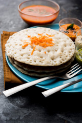 Set Dosa / Oothappam style dosa is a popular south Indian food served with sambar and chutney, selective focus