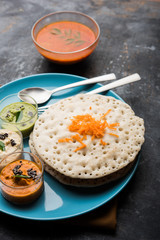 Set Dosa / Oothappam style dosa is a popular south Indian food served with sambar and chutney, selective focus