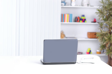 open laptop on the table in the psychologist's office