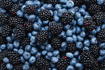 Blackberry and  blueberry background. Top view.