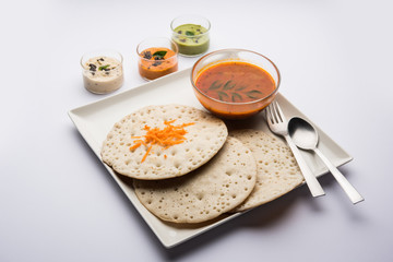 Set Dosa / Oothappam style dosa is a popular south Indian food served with sambar and chutney, selective focus