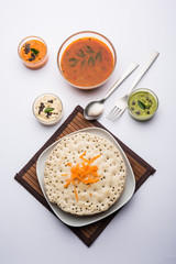 Set Dosa / Oothappam style dosa is a popular south Indian food served with sambar and chutney, selective focus