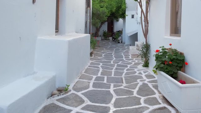 Walking in Naousa street on Paros island, Greece