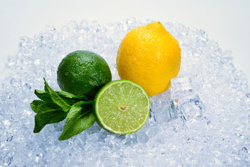 Lemon, lime and mint on ice.