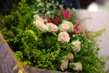 Obraz na płótnie Canvas Bouquet of elegant pink small roses
