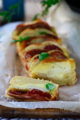 Italian cake with salami, potatoes and provolone.selective focus