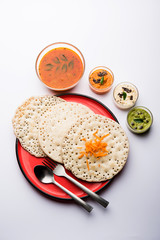 Set Dosa / Oothappam style dosa is a popular south Indian food served with sambar and chutney, selective focus