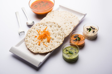 Set Dosa / Oothappam style dosa is a popular south Indian food served with sambar and chutney, selective focus