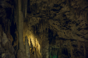 Fototapeta na wymiar stalactites and stalagmites in the Large Azish Cave of Adygea