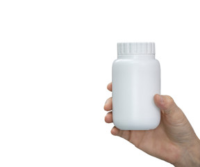 white medicine bottle in women hand on white background
