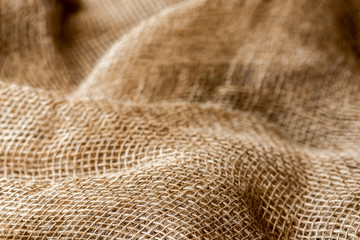 Brown sackcloth texture, background, selective focus