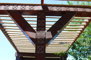 Wooden canopy under the blue sky