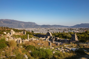 Obraz premium Xanthos Ancient City. Grave monument and the ruins of ancient city of Xanthos - Letoon (Xantos, Xhantos, Xanths) in Kas, Antalya/Turkey. Capital of Lycia.